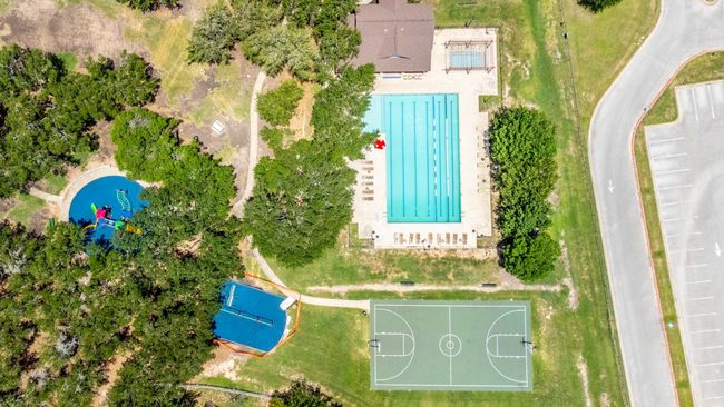 Community lap pool, basketball court, park, & one of the playgrounds. | Image 34