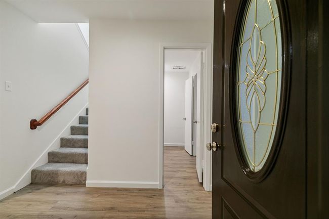 Living area featuring light hardwood / wood-style floors | Image 8