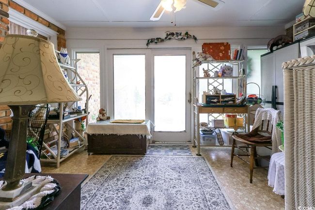 Sunroom featuring plenty of natural light | Image 21