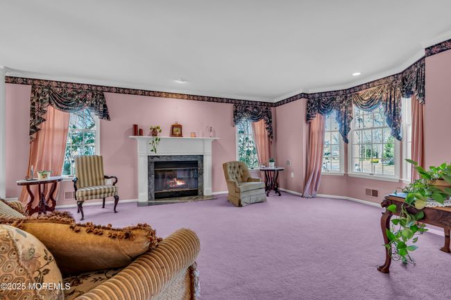 Living room with gas fireplace | Image 9