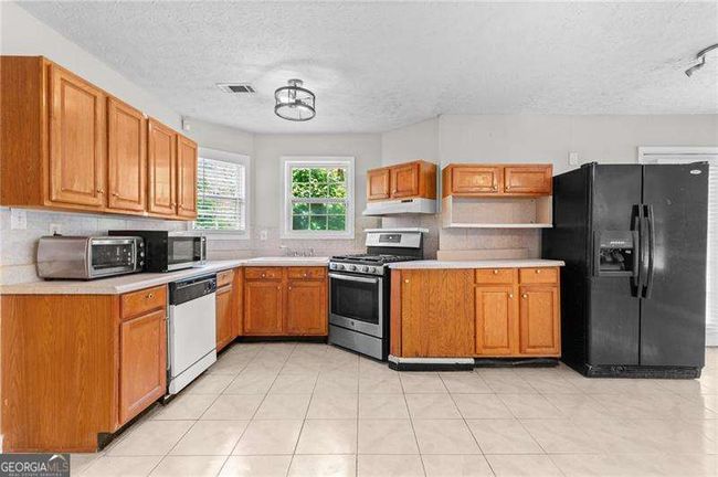 6416 Chestnut Glen Dr, House other with 4 bedrooms, 2 bathrooms and null parking in Norcross GA | Image 18