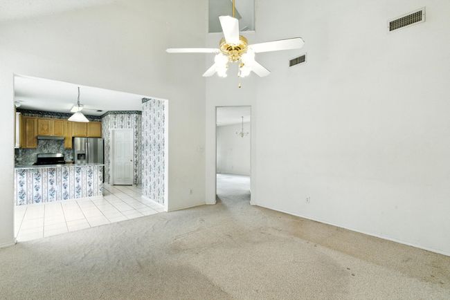Downstairs living/dining area | Image 8