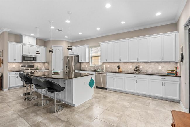 Extended Kitchen with plenty of counter space for your food preparation. | Image 18