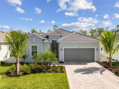 13527 Blue Bay Circle, House other with 4 bedrooms, 3 bathrooms and null parking in Fort Myers FL | Image 2