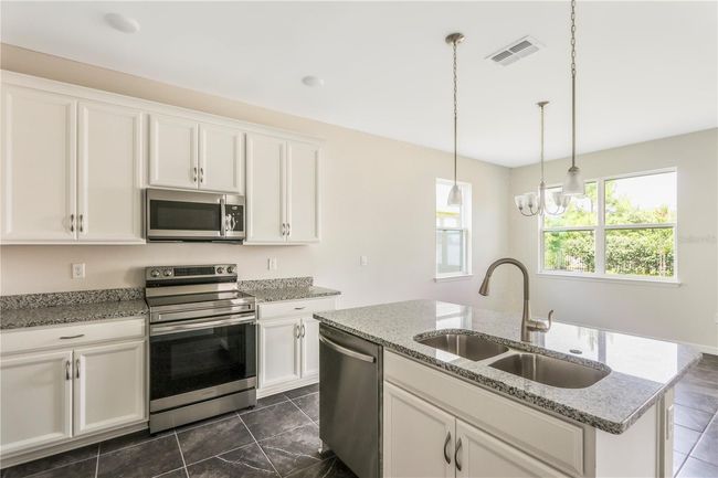 5191 Little Stream Lane, House other with 4 bedrooms, 2 bathrooms and null parking in Wesley Chapel FL | Image 6