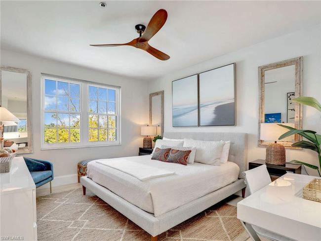 Bedroom featuring baseboards and ceiling fan | Image 8