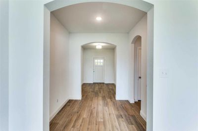 Hallway with wood-type flooring | Image 3