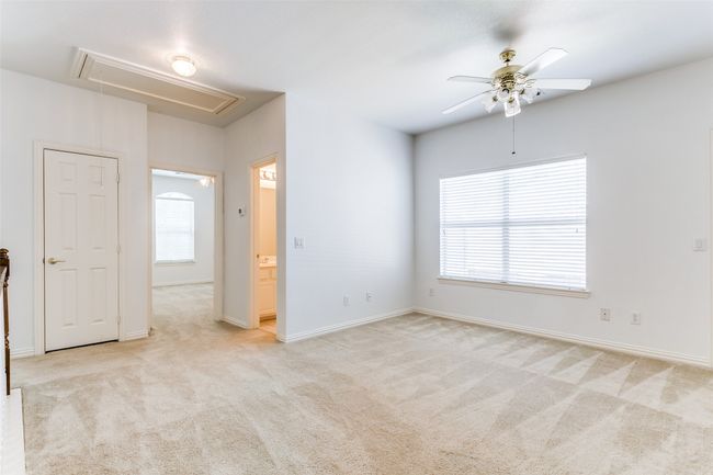 Upstairs loft/game room features enough space for furniture or gaming tables and a nice big closet with shelves. | Image 21