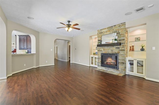 This fireplace and built-ins were custom built for our seller. This is not builder added! Super nice quality! | Image 13