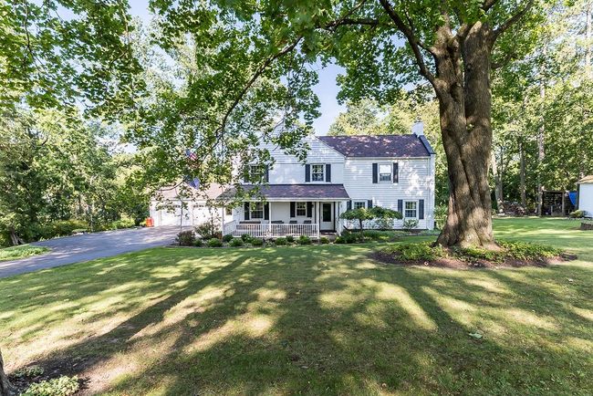 great curb appeal with the beautiful trees and meticulous landscape | Image 4