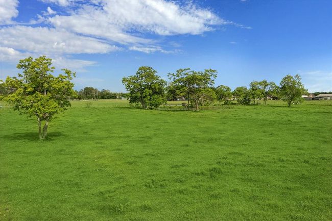 Back pasture is fenced for livestock and currently AG EXEMPT | Image 50