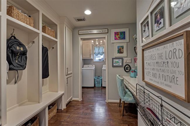 Across from Half Bath is entry into Mudroom, "command central" and Laundry room.This space is spacious, functional and tucked away. | Image 16