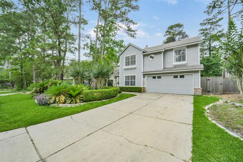 22 E New Avery Pl, The Woodlands, TX, 77382-1404 | Card Image