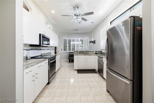 12802 Maiden Cane Ln, House attached with 3 bedrooms, 2 bathrooms and null parking in BONITA SPRINGS FL | Image 7