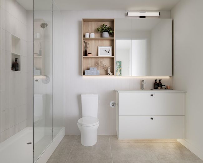 Bathroom with vanity, a walk in shower, toilet, and tile patterned flooring | Image 4