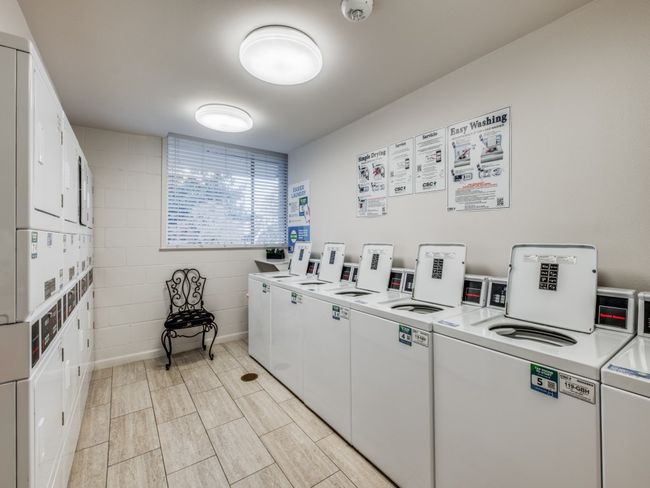 Clothes washing area featuring recently upgraded laundry equipment & cashless payment system. | Image 28