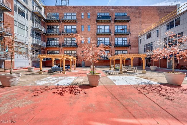 Surrounding community with a pergola and a patio area | Image 39