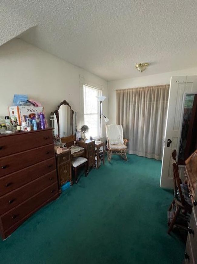 wall to wall closet in primary bedroom | Image 29