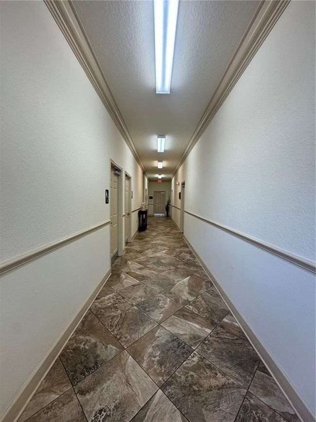 STE-102 - 9400 River Crossing Blvd, Home with 0 bedrooms, 0 bathrooms and null parking in New Port Richey FL | Image 6