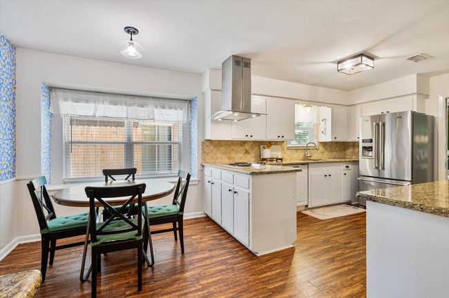 Breakfast area with built in window seat | Image 21