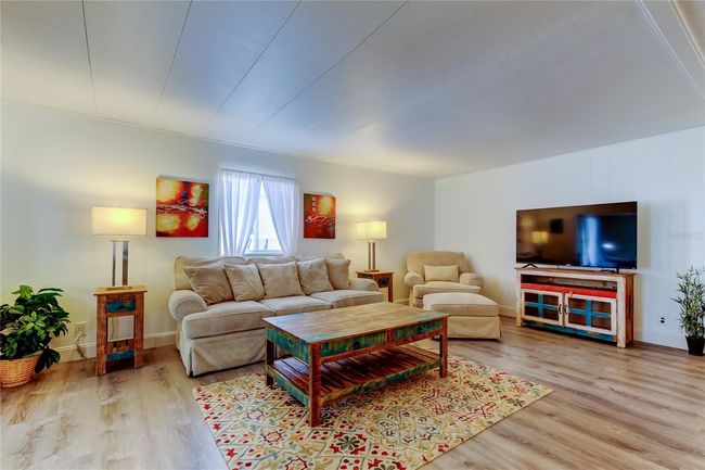 30. Living Area is a HUGE SO SPACIOUS & Flows Into DR, Kitchen + BONUS Room! LOVE the Cohesive Tasteful Furnishings = ALL INCLUDED!!. | Image 29