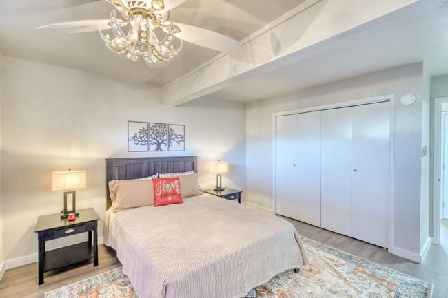 Bedroom with a closet lower unit | Image 8