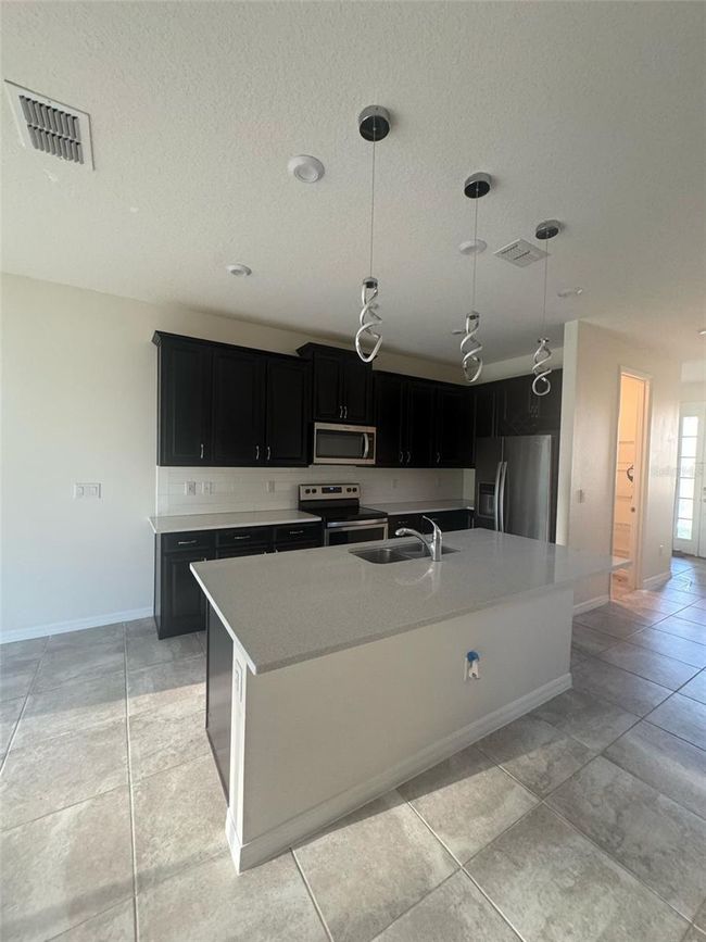 2440 Varenna Loop, House other with 3 bedrooms, 3 bathrooms and null parking in KISSIMMEE FL | Image 7