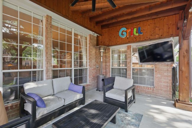 View of patio / terrace featuring outdoor lounge area and a ceiling fan | Image 33