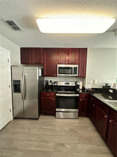 14052 Grove Resort Avenue, Condo with 2 bedrooms, 2 bathrooms and null parking in Winter Garden FL | Image 2