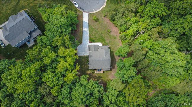 Bird’s-eye view of home and surrounding mature trees. | Image 37