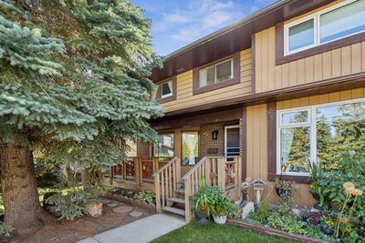 47 Coachway Rd Sw, Home with 4 bedrooms, 2 bathrooms and 2 parking in Calgary AB | Image 1