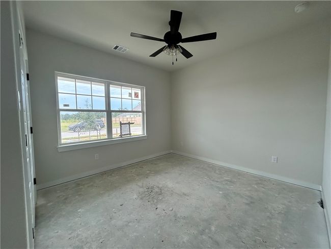 Spare room with concrete floors and a ceiling fan | Image 12
