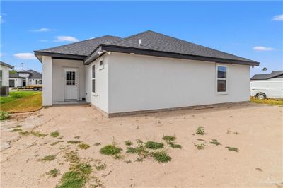 Rear view of house featuring central AC | Image 3