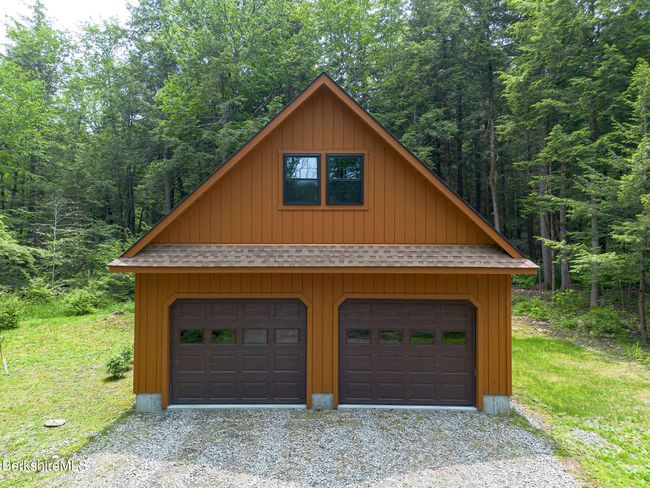 detached two-car garage with storage space above | Image 14
