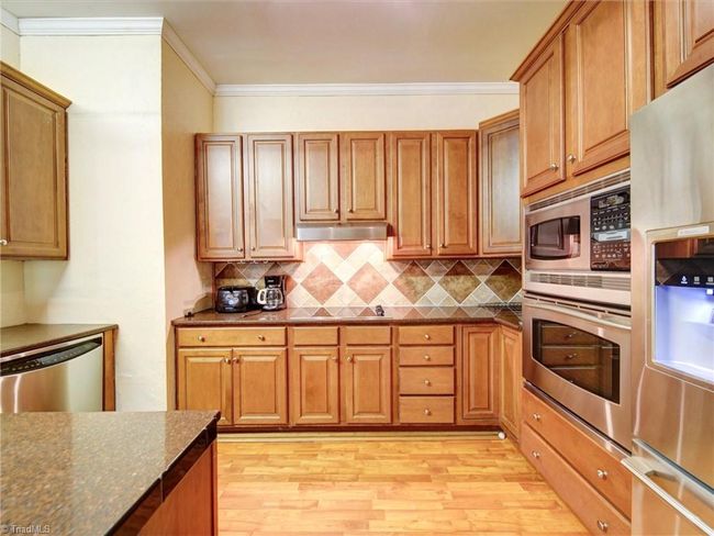Downstairs kitchen w/stove, refrig, oven, M/W & dishwasher | Image 35