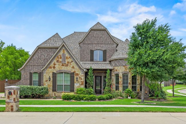 Charming Tudor on a corner lot in the GATED boutique PROSPER community of Crestview | Image 4