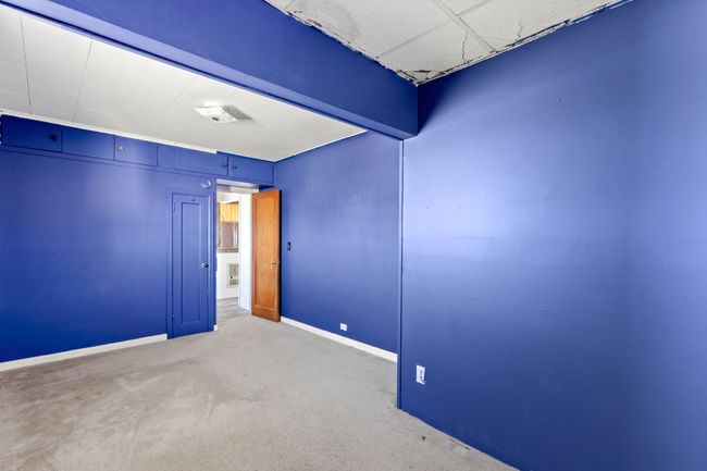 Spare room with carpet floors and baseboards | Image 31