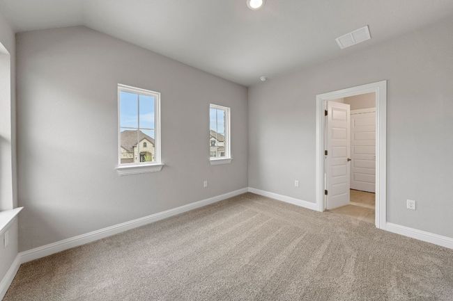 Unfurnished bedroom featuring carpet floors and baseboards | Image 17