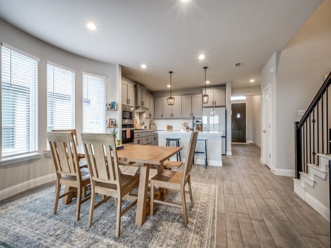 With plenty of room for a full-sized table, this space combines function and flexibility in the heart of the home. | Image 11