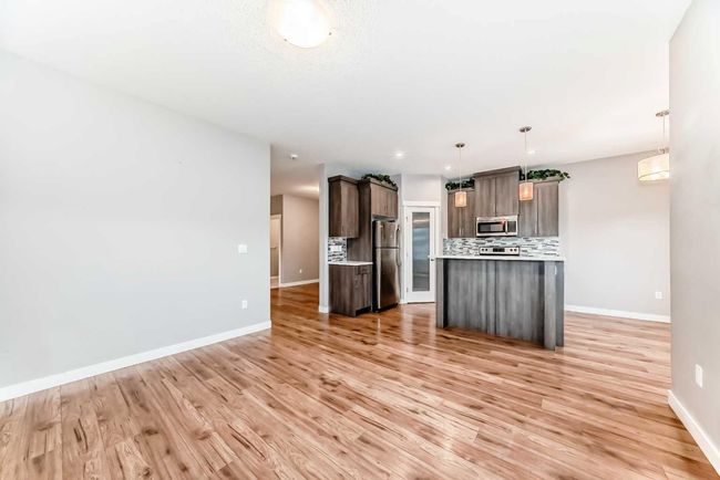 23 Baysprings Way Sw, Home with 3 bedrooms, 3 bathrooms and 1 parking in Airdrie AB | Image 12