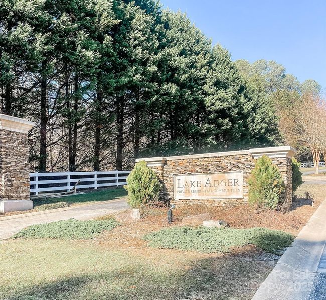 Private Community of Luxury High End Custom Homes on Lake Adger. STR Approved. Perfect for a corporate retreat home or large family gatherings. Home has 2 FulL living quarters on Main Level and a Full Finished lower level with additional flex/guest rooms and rec area. Amazing Lake Views and access! Pontoon and Matching Golf Cart Negotiable too. | Image 4
