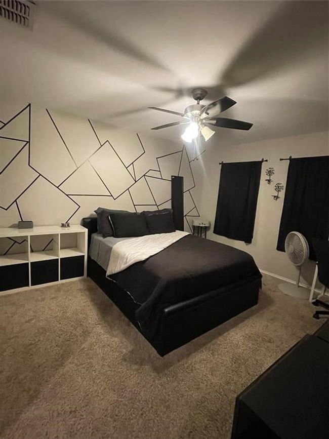 Bedroom featuring carpet and a ceiling fan | Image 23