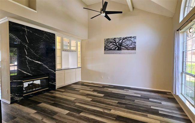 two sided fireplace and dry bar | Image 8