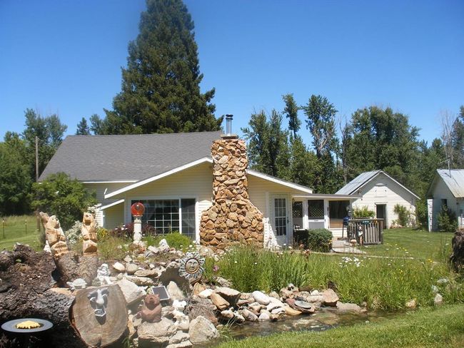 View of side of home with a chimney | Image 26