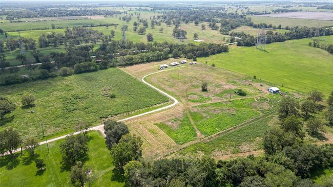 Set against the broader backdrop of Wharton County, the property carves out its own quiet footprint—ready for growth, projects, or peaceful retreat. | Image 46
