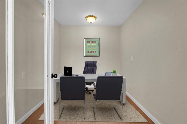 Home office featuring hardwood / wood-style flooring | Image 39