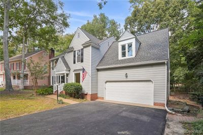 View of front facade with a garage | Image 2