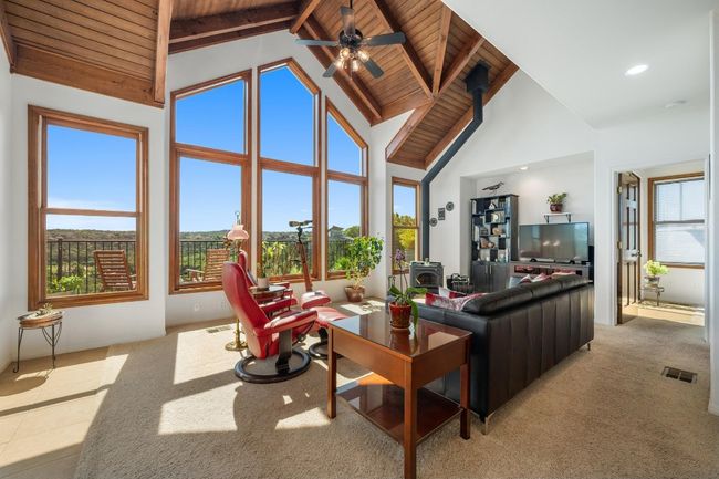 High ceilings with wood beams and planks. | Image 8