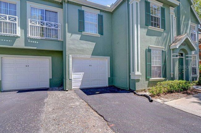 Deed Garage attached to building 16 with parking space in front of it | Image 47