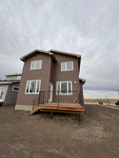 30 Clover St, House other with 3 bedrooms, 2 bathrooms and 6 parking in Beiseker AB | Image 2